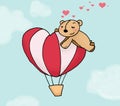 Loving bear on a montgolfier