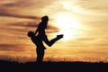 Loving beautiful couple of guys and girls at sunset in field