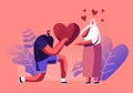 Loving Boyfriend Presenting Huge Heart to Girlfriend Standing on Knee on Happy Valentines Day. Man Making Proposal