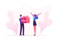 Loving Boyfriend Presenting Huge Wrapped Gift Box to Girlfriend on Happy Valentine Day, Birthday or any Holiday Royalty Free Stock Photo