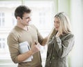 Loving business couple looking at each other in office Royalty Free Stock Photo