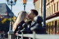 Kiss. Loving couple on a background of romantic old European city