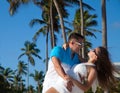 Loving couple - beach at summer - the romantic date or wedding o Royalty Free Stock Photo