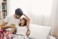 Loving couple drinking coffee in bed Royalty Free Stock Photo