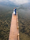Loving couple on the dock at the lake Royalty Free Stock Photo