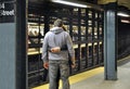 Loving couple embracing at subway station