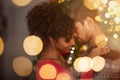 Loving couple embracing with warm lights Royalty Free Stock Photo