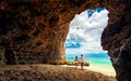 A loving couple enjoy honeymoon vacation on tropical beach Royalty Free Stock Photo