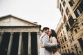 Loving couple in front of the Pantheon in Rome