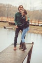 Loving couple happy together outdoor on rainy walk on country side,