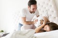 Loving couple having fun in bed Royalty Free Stock Photo