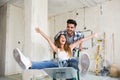 Loving couple is having fun while renovating their home Royalty Free Stock Photo