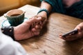 Loving couple holding hands with gentleness Royalty Free Stock Photo