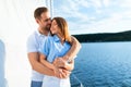 Loving Couple Hugging Enjoying Romantic Yacht Tour On Vacation