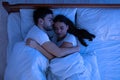 Loving Couple Hugging Sleeping In Bed At Home, Above View Royalty Free Stock Photo