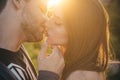 Loving couple kissing outdoor at sunset, love and lifestyle. Sensual kiss. Young couple kisses, Sexy lovers. Royalty Free Stock Photo