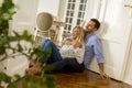 Loving couple looking at each other while drinking red wine on f Royalty Free Stock Photo