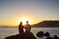 Loving couple looking at the sun