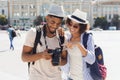 Loving couple looking on their photos on camera Royalty Free Stock Photo