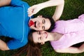 Loving couple lying on a grass Royalty Free Stock Photo