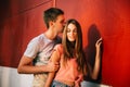 Loving couple outdoors. Boy kissing the girl Royalty Free Stock Photo