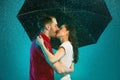 The loving couple in the rain Royalty Free Stock Photo