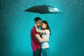 The loving couple in the rain Royalty Free Stock Photo