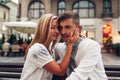 Loving couple relaxing in old Lviv city wearing traditional national ukrainian shirts. Newlyweds spend time together Royalty Free Stock Photo