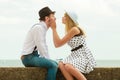 Loving couple retro style dating on sea coast Royalty Free Stock Photo