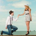 Loving couple retro style dating on sea coast Royalty Free Stock Photo