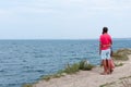 Loving couple on the seashore looks into the distance. Royalty Free Stock Photo