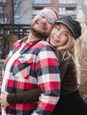 Loving couple smiling outdoor. Cute couple of hipsters is walking in spring park. Beautiful sunny day. Walking on the city`s Royalty Free Stock Photo