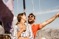 Couple spending happy time on a yacht at sea. Luxury vacation on a seaboat Royalty Free Stock Photo