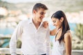 Loving couple spending vacation on tropical resort swimming pool.Newlyweds honeymoon on seaside Royalty Free Stock Photo