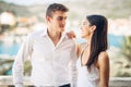 Loving couple spending vacation on tropical resort swimming pool.Newlyweds honeymoon on seaside Royalty Free Stock Photo