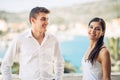 Loving couple spending vacation on tropical resort swimming pool.Newlyweds honeymoon on seaside Royalty Free Stock Photo