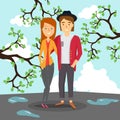 Loving couple in spring on the background of the puddles and the blossoming trees.