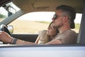 Loving young couple traveling by car Royalty Free Stock Photo