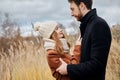 Loving couple walking in Park in autumn hugs and kisses. Autumn Royalty Free Stock Photo