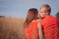 The loving couple walks on the wheat field Royalty Free Stock Photo