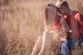 The loving couple walks on the wheat field Royalty Free Stock Photo