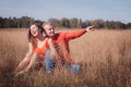 The loving couple walks on the wheat field Royalty Free Stock Photo