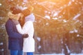 Loving couple in winter nature