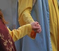 loving couples holding hands in medieval clothes