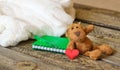 Loving Dog toy with notepade and red heart. Valentines Day. Vintage style. Creative greeting card, wood. Partial blurred