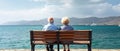 Loving the elderly couple sitting on a bench Royalty Free Stock Photo