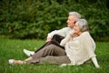 Portrait of cute elderly couple in park Royalty Free Stock Photo
