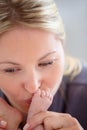 Loving every tiny bit of him. Closeup shot of a mother tenderly kissing her newborn babys tiny feet. Royalty Free Stock Photo