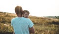 Loving family. Father and his son baby boy playing and hugging outdoors. Happy dad and son outdoors. Concept of Father`s day. Royalty Free Stock Photo