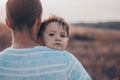 Loving family. Father and his son baby boy playing and hugging outdoors. Happy dad and son outdoors. Concept of Father`s day. Royalty Free Stock Photo